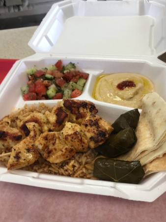 Mediterranean Delight has an extensive menu of Middle-Eastern fare including chicken skewers with rice, hummus with pita, grape-leaf rolls, and a cucumber salad.Â Homemade pita chips sprinkled with spices and herbs are a customer favorite. (Submitted photo)