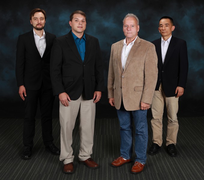 Recipients of the Director’s Award for Outstanding Team Accomplishment at Oak Ridge National Laboratory are, from left, Jason Pries, Tim Burress, Randy Wiles, and Lixin Tang. (Photo by Oak Ridge National Laboratory, U.S. Department of Energy)