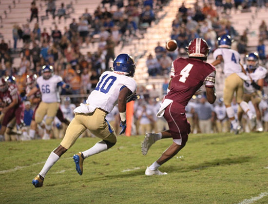 Oak Ridge senior wide receiver Caleb Martin (4) led receivers with 73 yards on four catches, including the touchdown reception pictured here, during a 49-3 homecoming win for the Wildcats on Blankenship Field on Friday, Sept. 29, 2017. Martin is defended here by Karns junior Thomas Harper (10). (Photo by Luther Simmons)