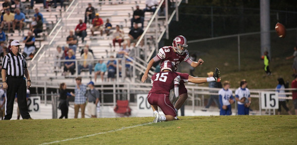 Oak Ridge senior Carson McGhee (33) kicked the first four extra points during a 49-3 homecoming win for the Wildcats on Blankenship Field on Friday, Sept. 29, 2017. Holding here is junior Kevin Reedy (15). (Photo by Luther Simmons)
