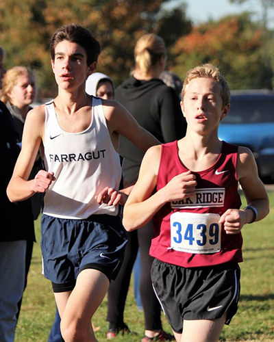 Pictured above is Oak Ridge freshman Eli Cox, who finished 39th in the boys 5,000-meter cross country race in the Region 2 Large Division Championships at Victor Ashe Park in Knoxville on Thursday, Oct. 26, 2017. (Photo by Maddie Zawisza)