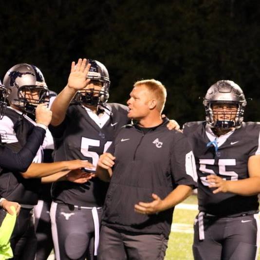 Anderson County Mavericks Coach Davey Gillum is pictured above with members of the football team in this Facebook profile photo.