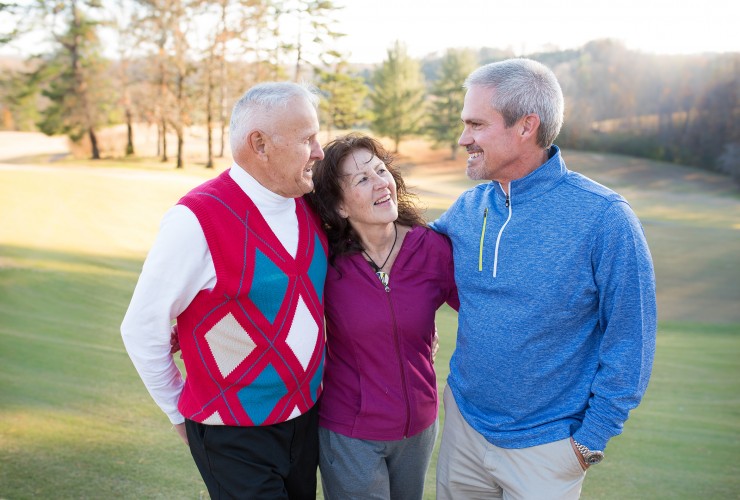 New Roane State golf coach Chris Griffin, right, chats with his mentor and Roane State’s first golf coach Eddie Liskovec, left, and Eddie’s wife, Muffin. (Photo by Roane State)