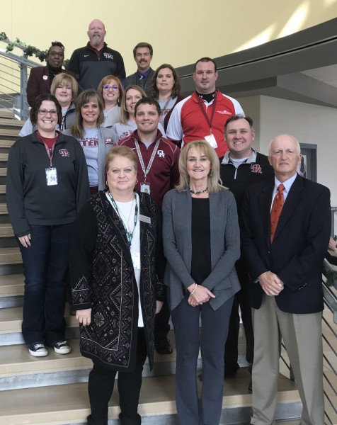 Oak Ridge Schools is the first district in Tennessee—and only the second entire district in the world—to earn district-wide STEM certification from AdvancED, officials said Friday. STEM stands for science, technology, engineering, and mathematics. The picture above includes administrators from Oak Ridge Schools and Oak Ridge High School. (Photo by Oak Ridge Schools)
