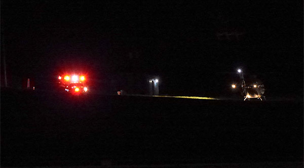 A University of Tennessee Lifestar medical helicopter, right, responded to a two-vehicle head-on crash on Scarboro Road near the Y-12 National Security Complex on Monday evening, Dec. 4, 2017. An Anderson County EMS ambulance is at left. The ambulance and helicopter are both at Y-12 above. (Photo by John Huotari/Oak Ridge Today)
