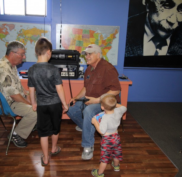 Amateur ham radio operators Jim Bogard, right, and Dan Mantooth, left, help children learn about amateur radio at an earlier Kids Day at the Children’s Museum of Oak Ridge. (Submitted photo)