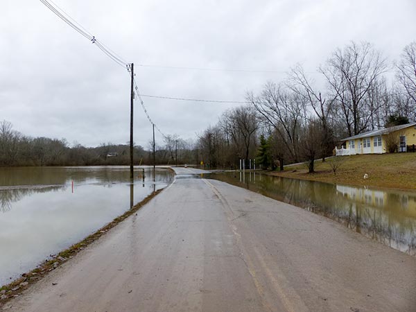 Flooding was unusually high on Airport Road just east of Oliver Springs on Sunday, Feb. 11, 2018. (Photo by John Huotari/Oak Ridge Today)