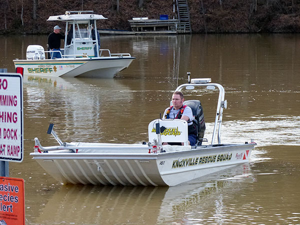 The Knoxville Volunteer Rescue Squad helps search for a missing man in the water at Bull Run Park in Claxton, authorities said Sunday afternoon, Feb. 18, 2018. An Anderson County Sheriff's Department boat is in left background. (Photo by John Huotari/Oak Ridge Today)