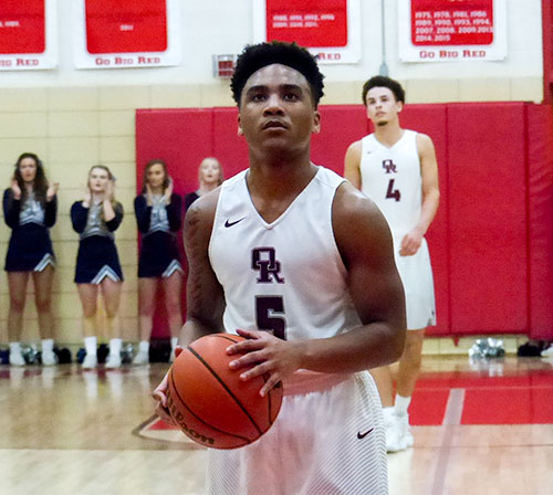 Levert Smith (5) of Oak Ridge during a District 3-AAA semifinal game against Anderson County at Halls on Friday, Feb. 16, 2018. Behind him is Seth Caldwell (4). (Photo by John Huotari/Oak Ridge Today)