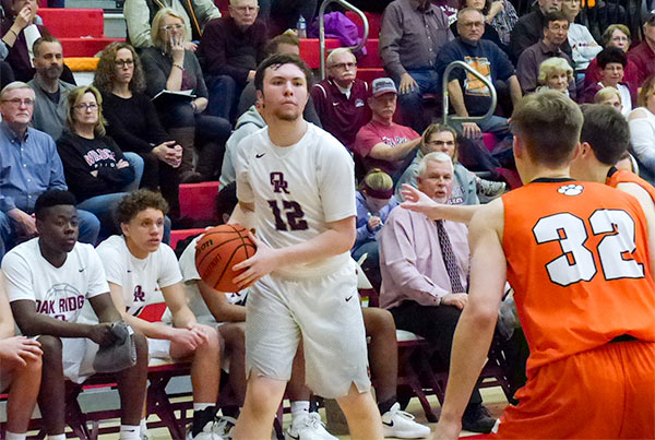 Joe Kesterson (12) of Oak Ridge looks for a pass during a 60-58 loss to Powell in the District 3-AAA championship at Halls on Saturday, Feb. 17, 2018. (Photo by John Huotari/Oak Ridge Today)