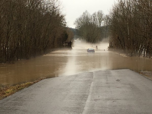 A car is stuck in flood water on Pumpkin Hollow Road in Anderson County on Sunday, Feb. 11, 2018. (Photo courtesy Anderson County Sheriff's Department)
