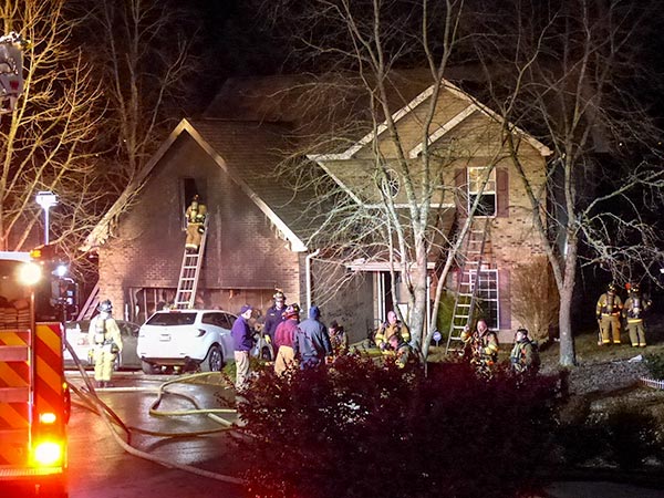 A minor injury was reported and several people escaped from a house fire on Tiffany Place in central Oak Ridge on Monday evening, Feb. 5, 2018, authorities said. (Photo by John Huotari/Oak Ridge Today)