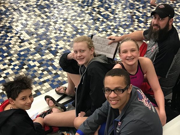 Pictured above from left to right are Logan Hall, Abigail King, Tais Brown, Mason Fischer, and Coach Andy Wagner as they prepare for upcoming swims. (Submitted photo)