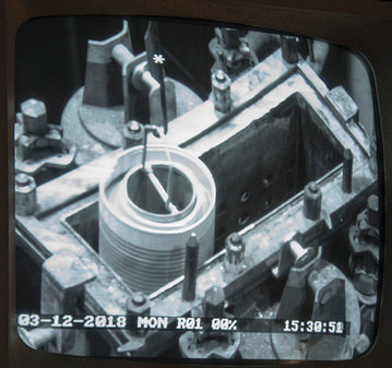 A High Flux Isotope Reactor core from Oak Ridge National Laboratory is dropped into the H Canyon dissolver at the Savannah River Site in Aiken, S.C. (Photo courtesy U.S. Department of Energy Office of Environmental Management)