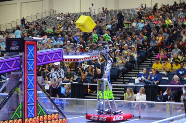 The Secret City Wildbots compete in the Palmetto Regional FIRST Robotics competition on Friday, March 2, 2018. Pictured above is Mantis, the robot, loads a power cube on the scale. (Photo by Angi Agle)