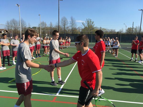 Pictured left to right are Oak Ridge Wildcats Levi Parrish and Miko Jakowski meeting Maryville’s Blake Miles and Nathan Vaughn during team introductions for doubles matches on Thursday, April 12, 2018. (Photo courtesy David Bowman)