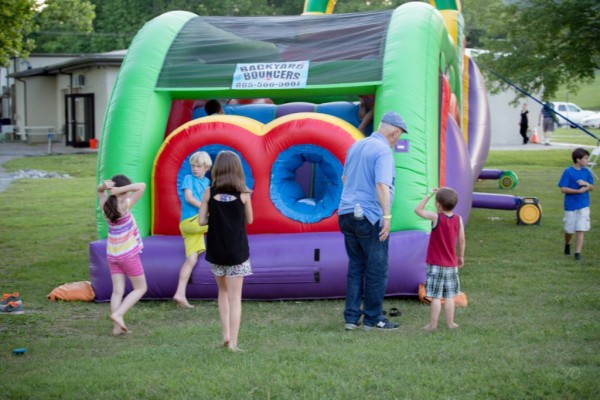 Children enjoying a bounce house at the Flatwater Festival in 2017. (Photo courtesy Flatwater Festival)