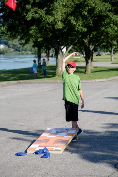 People of all ages enjoy playing cornhole games at the Flatwater Festival in 2017. (Photo courtesy Flatwater Festival)