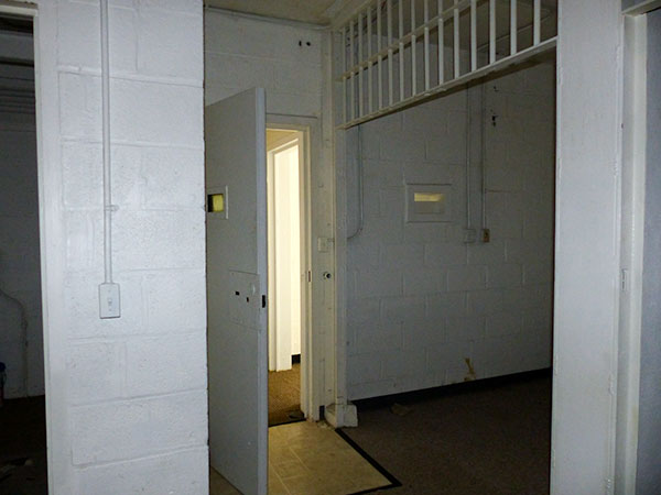 Pictured above is the interior of what has been described as a former federal secure communications center. It had a heavy steel door described as bulletproof and two holding cells. The building at 101 Bus Terminal Road had been used by both military police and the Oak Ridge Police Department. (Photo by John Huotari/Oak Ridge Today)