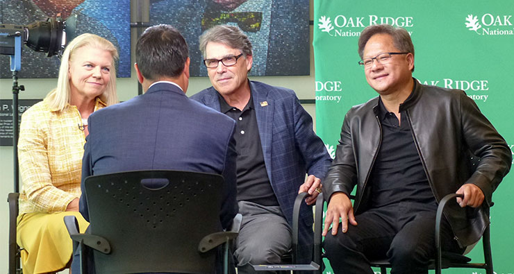 Pictured above being interviewed by a CNBC television crew before a ceremony on Friday afternoon, June 8, 2018, for the new Summit supercomputer at Oak Ridge National Laboratory are Ginni Rometty, left, chairman, president, and chief executive officer of IBM; Rick Perry, second from right, U.S. Department of Energy secretary; and Jensen Huang, right, founder, president, and CEO of NVIDIA. (Photo by John Huotari/Oak Ridge Today)