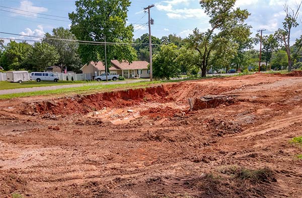 After a years-long dispute over alleged code violations, the 13 Applewood Apartments buildings on Hillside Road and Hunter Circle have been demolished. The site of one former building at Hillside Road and East Hunter Circle is pictured above on Monday, July 9, 2018. (Photo by John Huotari/Oak Ridge Today)
