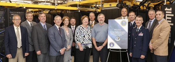 To expand its weather modeling capabilities, the U.S. Air Force has joined computer experts at the U.S. Department of Energy's Oak Ridge National Laboratory in a strategic collaboration that includes purchasing and operating of a new high-performance weather modeling computer system.  Key members of the Air Force and ORNL teams met July 10, 2018 to kick off the project and tour the facilities supporting the new system.  (Photo courtesy of ORNL)