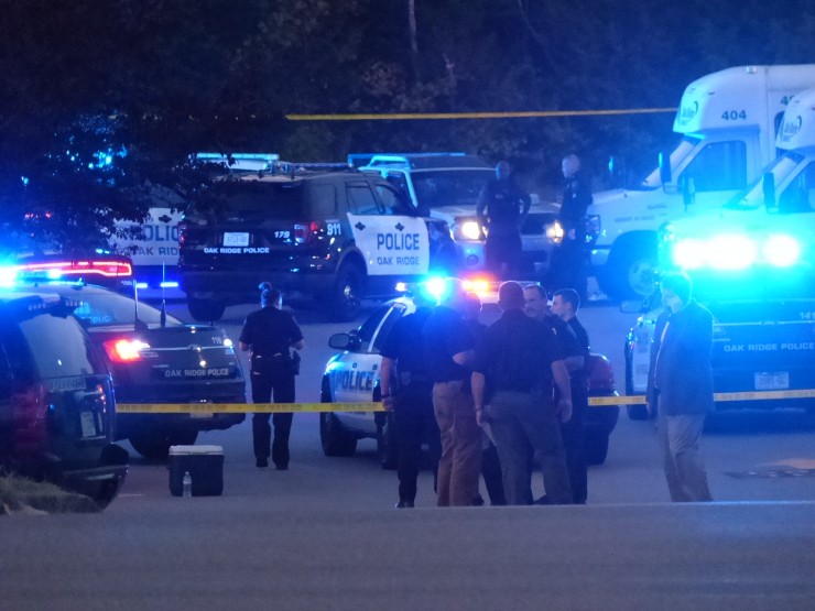 Police are investigating after a chase was reported along Emory Valley Road and there were reports of shots fired on Monday evening, Oct. 8, 2018. The parking lot at Anderson County General Sessions Court on Emory Valley Road is blocked off with yellow tape, and there is a large emergency response presence that includes members of the Oak Ridge Police Department, Oak Ridge Fire Department, Anderson County EMS, and District Attorney General Dave Clark, right. (Photo by John Huotari/Oak Ridge Today)