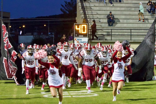 The Oak Ridge Wildcats enter the field before a 54-28 win at Clinton on Friday, Oct. 12, 2018. (Photo by Barry Houchin)