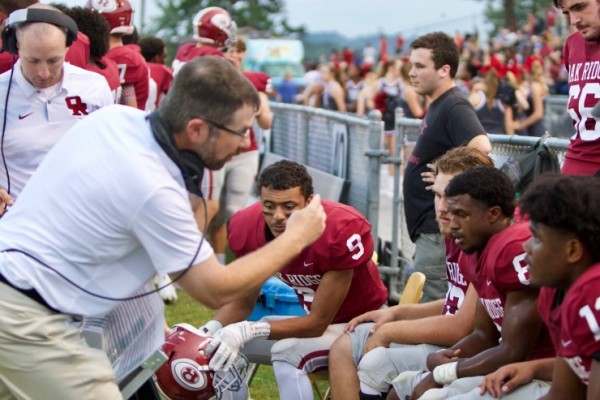 Oak Ridge coaches are pictured talking to Wildcats during a 41-12 win over Dobyns-Bennett on Friday, Aug. 24, 2018. (Photo by Barry Houchin)