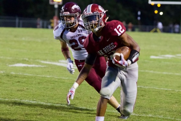 Oak Ridge senior Kai'Reese Pendergrass (12) runs against Dobyns-Bennett during a 41-12 win for the Wildcats on Blankenship Field on Friday, Aug. 24, 2018. (Photo by Barry Houchin)
