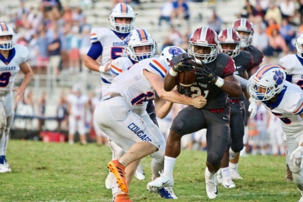 Oak Ridge junior Tyrell Romano (21) runs against Campbell County during a 44-14 win over the Cougars on Blankenship Field on Friday, Aug. 31, 2018. (Photo by Barry Houchin)