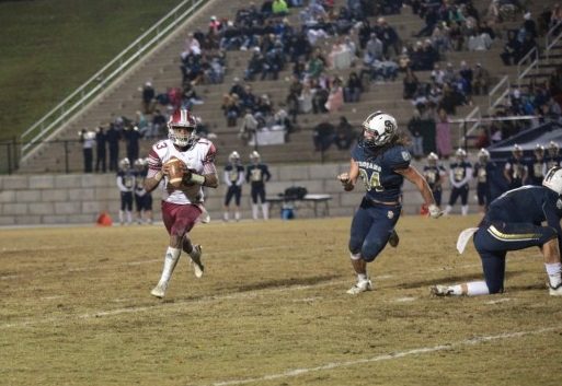 Oak Ridge senior quarterback Herbert Booker (13), left, is pictured during a 40-23 win at Soddy-Daisy on Friday, Nov. 9, 2018. (Photo by Luther Simmons)