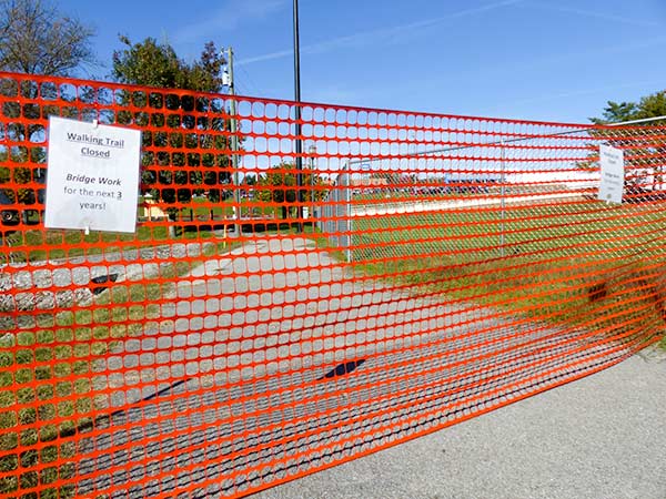 Work is under way on the bridge to replace the Honorable William Everette Lewallen Bridge over the Clinch River on Clinch Avenue between downtown Clinton and South Clinton. A walking trail at Lakefront Park will be closed for three years. The work is pictured above on Tuesday, Oct. 30, 2018. (Photo by John Huotari/Oak Ridge Today) 