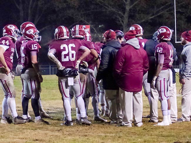 The Oak Ridge Wildcats defense huddles during a 42-40 loss to Catholic in a Class 5A quarterfinal game on Blankenship Field on Friday, Nov. 16, 2018. (Photo by John Huotari/Oak Ridge Today)