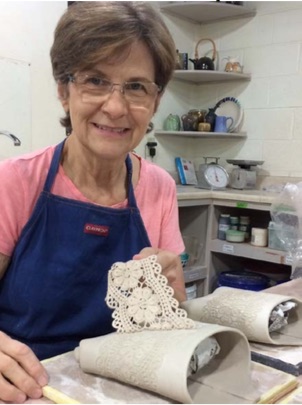 Scottie Baxter is a new crafter at the Pilot Club’s 42nd annual Arts and Crafts Fair in Oak Ridge on Friday, Nov. 16, and Saturday, Nov. 17, 2018. Scottie creates vintage lace wall pockets out of lace. Here she is removing the lace from one of her wall pockets. (Submitted photo)