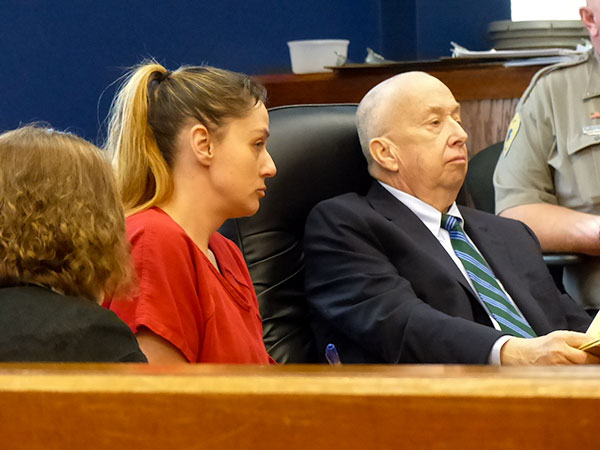The homicide charge filed against Christy Viola Comer, 37, middle, was sent to the Anderson County Grand Jury after a preliminary hearing in Anderson County General Sessions Court in Clinton on Tuesday, Jan. 22, 2019. At right is defense attorney Leslie Hunt. (Photo by John Huotari/Oak Ridge Today)