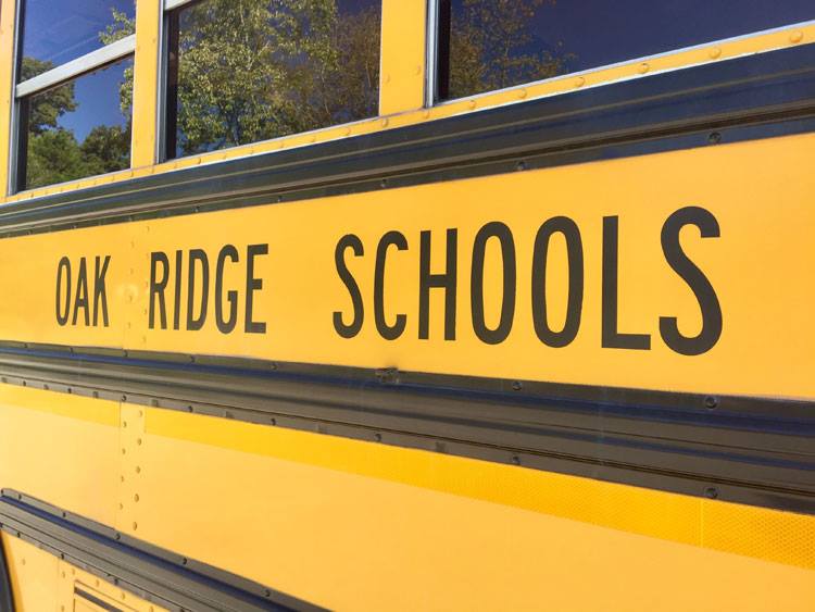 No injuries reported when car crashes into school bus - Oak Ridge Today