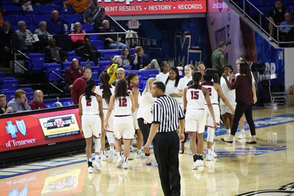 The Oak Ridge Lady Wildcats are pictured above in a timeout during a 65-49 win over Science Hill in a Class AAA girls basketball tournament quarterfinal game in Murphy Center at Middle Tennessee State University in Mufreesboro on Thursday, March 7, 2019. (Photo by Luther Simmons)