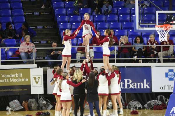The Oak Ridge High School cheerleaders are pictured above during a 65-49 win for the Lady Wildcats over Science Hill in a Class AAA girls basketball tournament quarterfinal game in Murphy Center at Middle Tennessee State University in Mufreesboro on Thursday, March 7, 2019. (Photo by Luther Simmons)