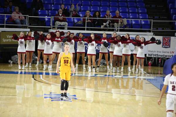 The Oak Ridge High School cheerleaders are pictured above during a 65-49 win for the Lady Wildcats over Science Hill in a Class AAA girls basketball tournament quarterfinal game in Murphy Center at Middle Tennessee State University in Mufreesboro on Thursday, March 7, 2019. (Photo by Luther Simmons)