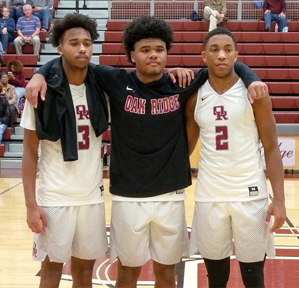 Oak Ridge players named to the All Tournament Team after the Region 2-AAA championship game at Wildcat Arena on Thursday, Feb. 28, 2019, are seniors JaVonte Thomas (3), left; Herbert Booker (10), center; and most valuable player Marcus Smith (2). (Photo by John Huotari/Oak Ridge Today)