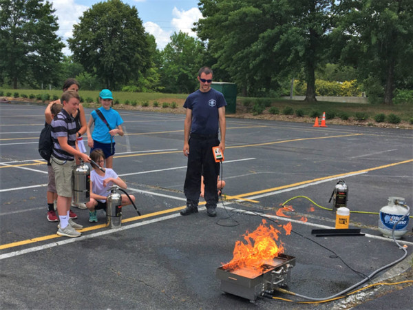 The City of Oak Ridge, Oak Ridge Fire Department, and Oak Ridge Police Department recognized a local student, Wesley Alig,a 13-year-old student at Jefferson Middle School, on Thursday for his quick actions to stop a fire from spreading inside his home last year. Above is a fire demonstration at Junior Police Academy in 2018. (Photo courtesy City of Oak Ridge)