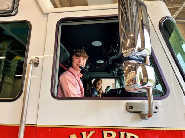 The City of Oak Ridge, Oak Ridge Fire Department, and Oak Ridge Police Department recognized a local student, Wesley Alig, a 13-year-old student at Jefferson Middle School, on Thursday for his quick actions to stop a fire from spreading inside his home last year. Wesley received a ride in a fire engine as part of the recognition of his actions. (Photo courtesy City of Oak Ridge)