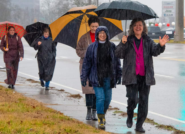 Human Rights Rally Marchers in Rain 2019